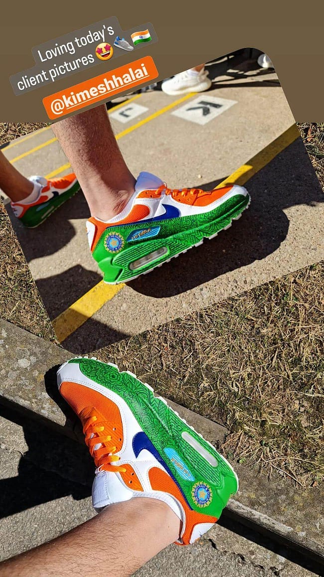 Man wearing his Team India cricket hand painted Nike Air Max sneakers - green and orange